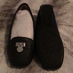 Pair black Micheal Kors penny lofters